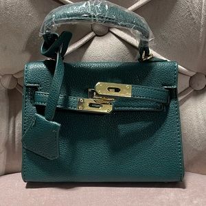Brand New Mini cross body bag with long strap